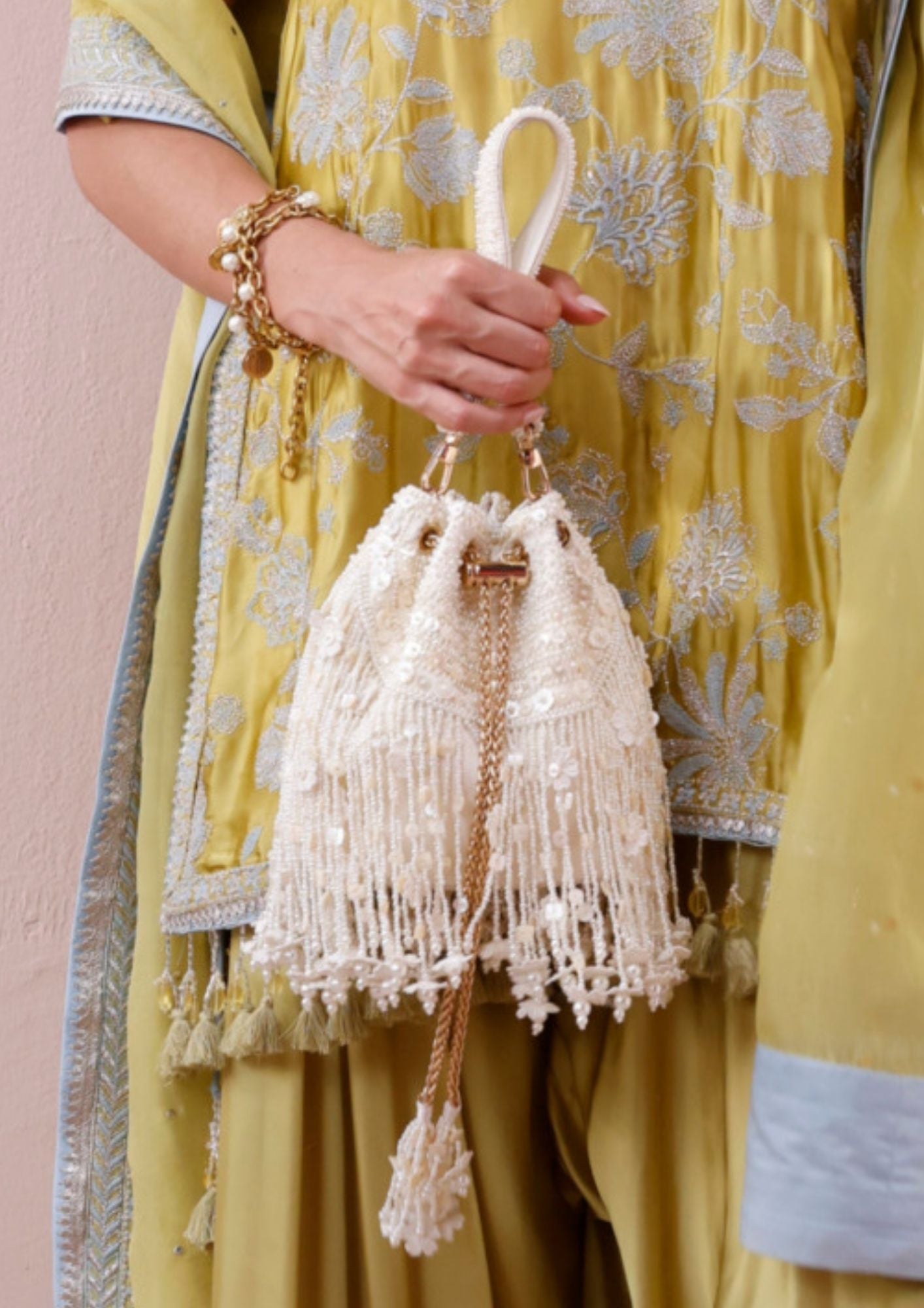 Snow White Floral Tassels Offwhite Potli Bag